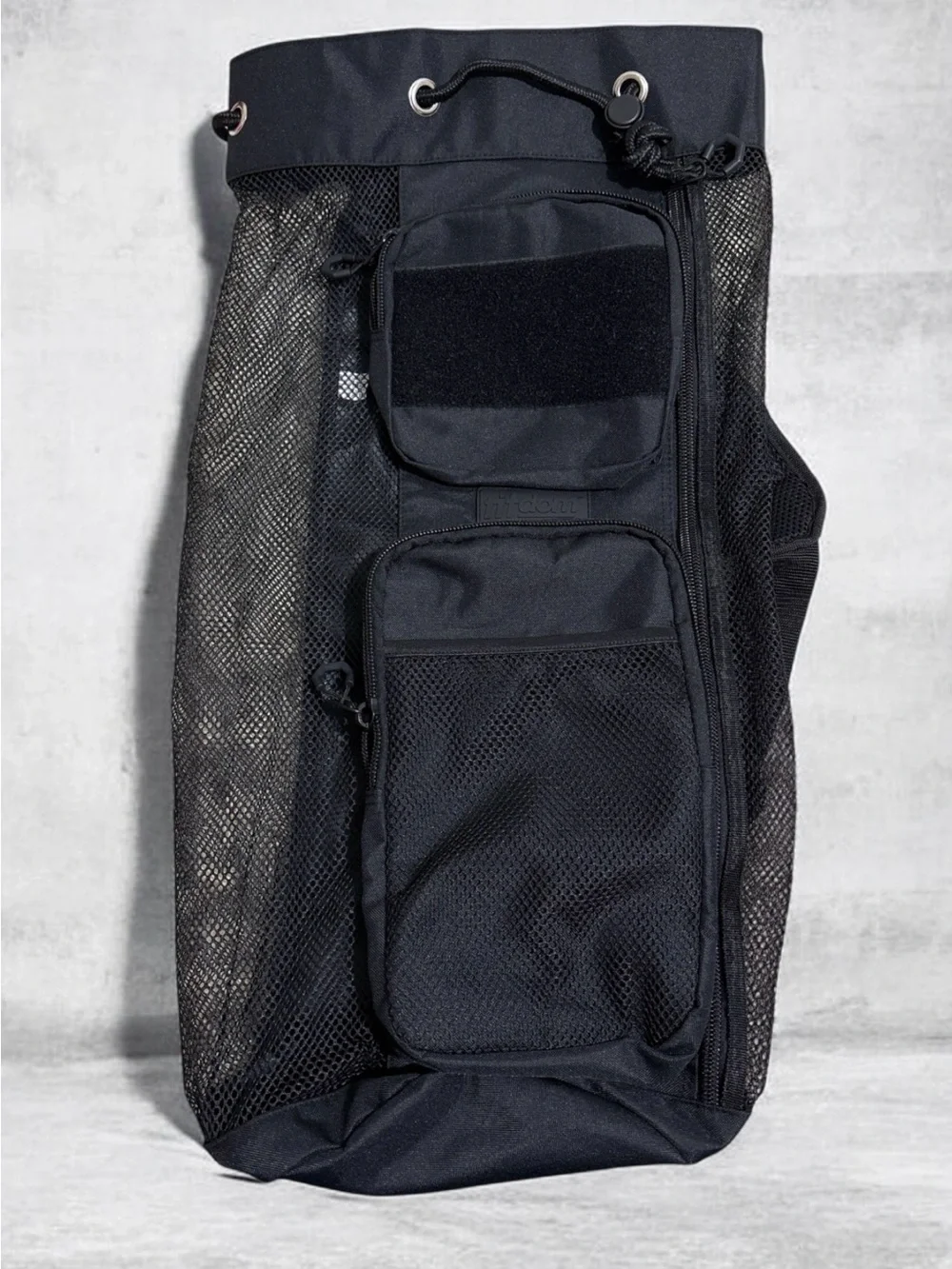Black Sports Sling Backpack with Mesh Ball Storage